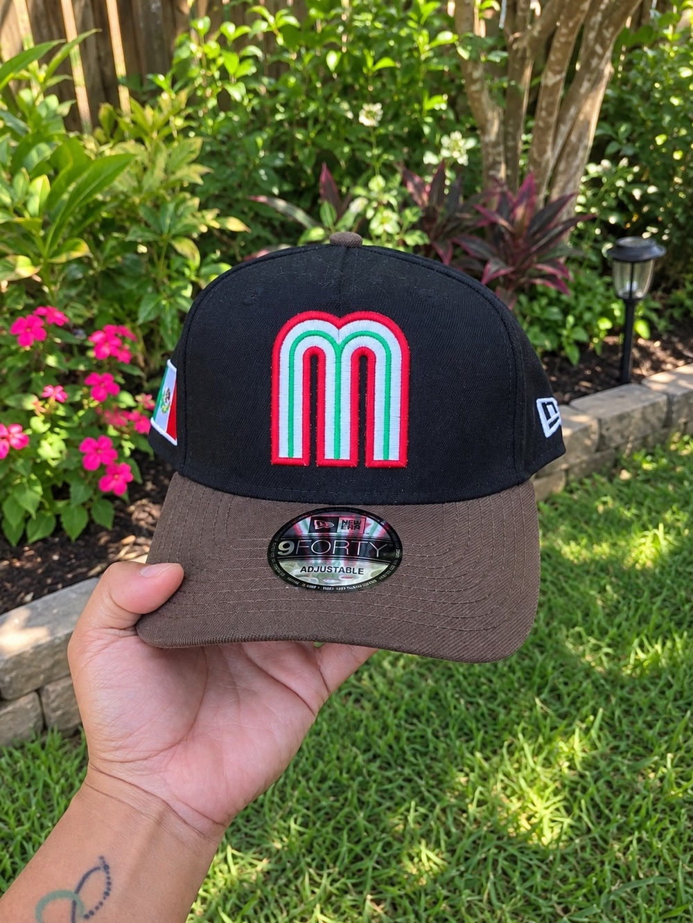 New Era Black and Brown 9FORTY Cap with Red, Green & White Logo